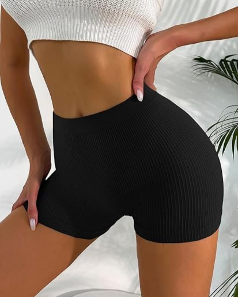 Pantaloni corti aderenti a righe