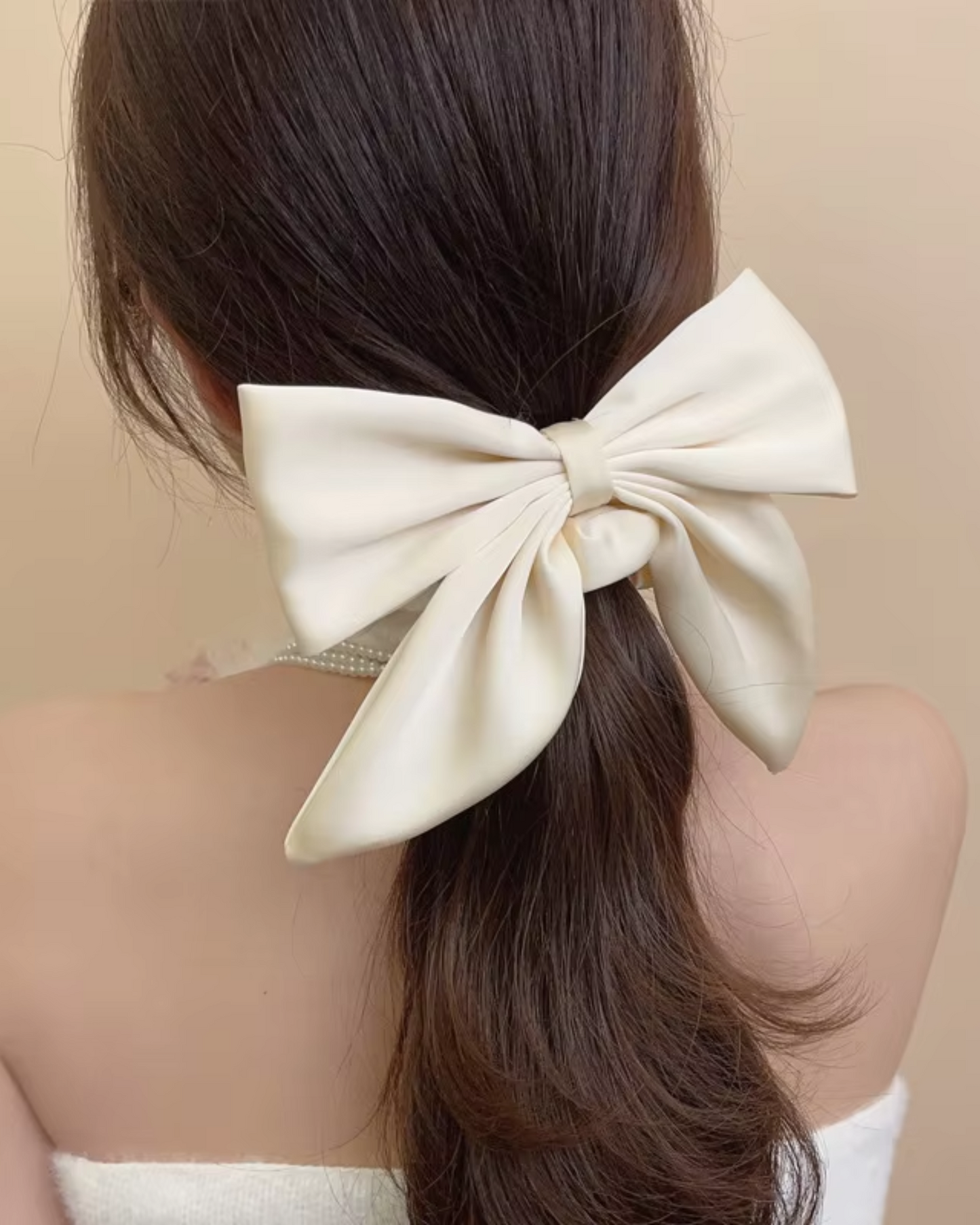 Fascia in satin per capelli con fiocco