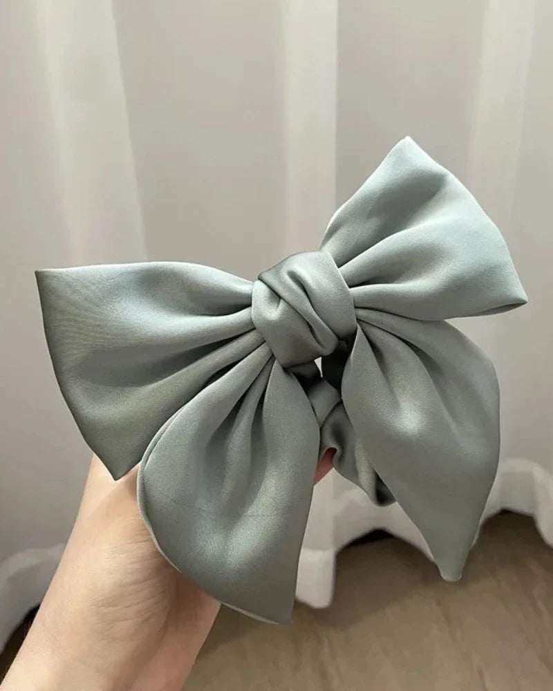 Fascia in satin per capelli con fiocco