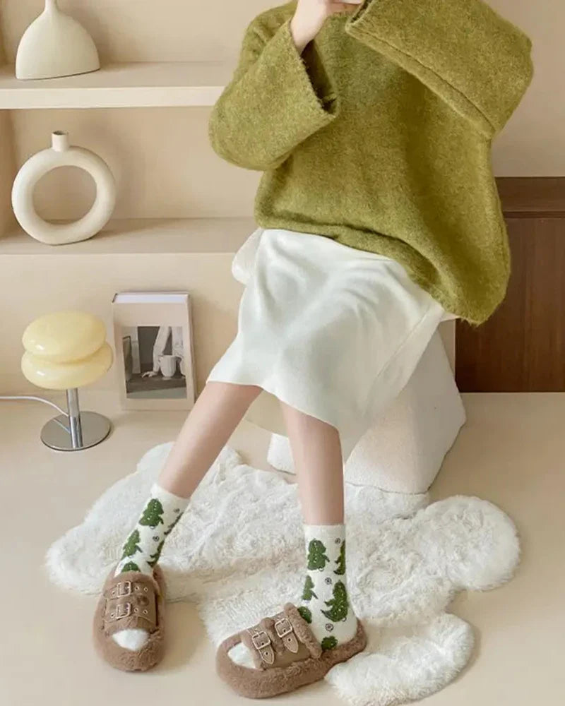 Calze lunghe e pelose con motivo di dinosauri