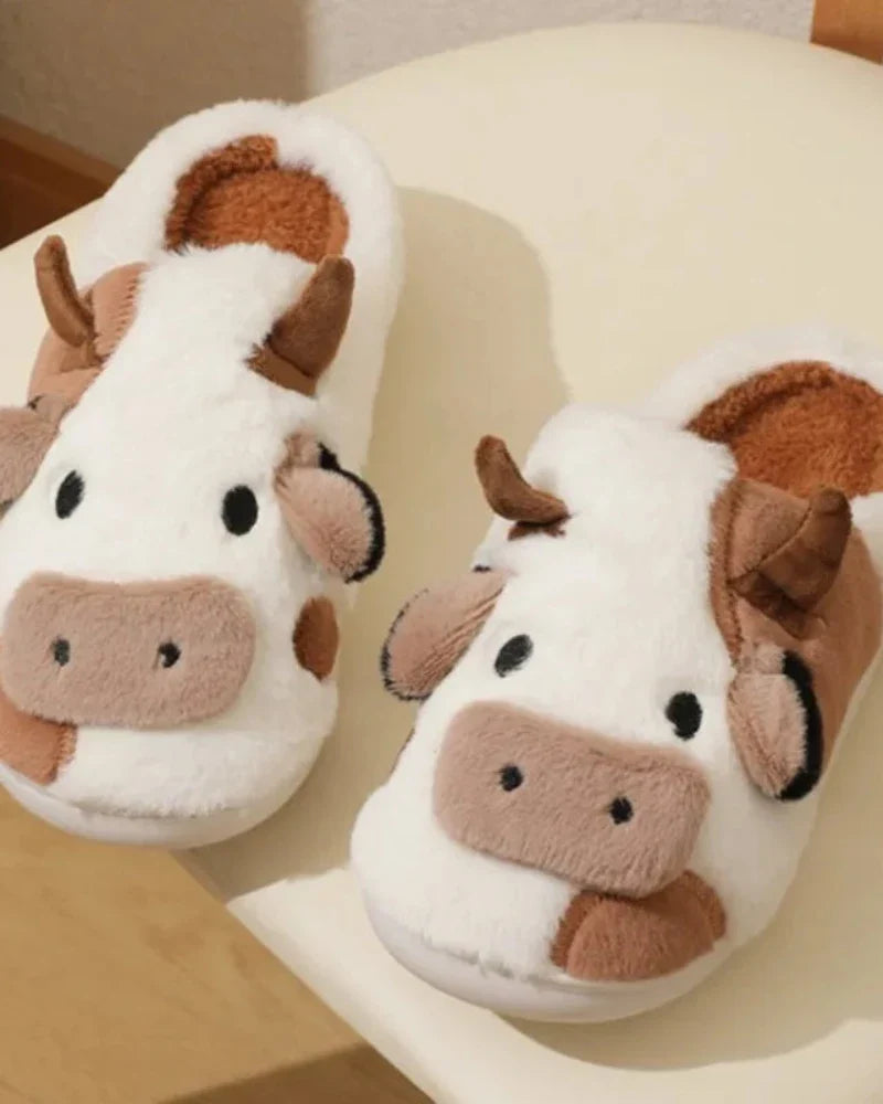 Pantofole pelose a forma di mucca