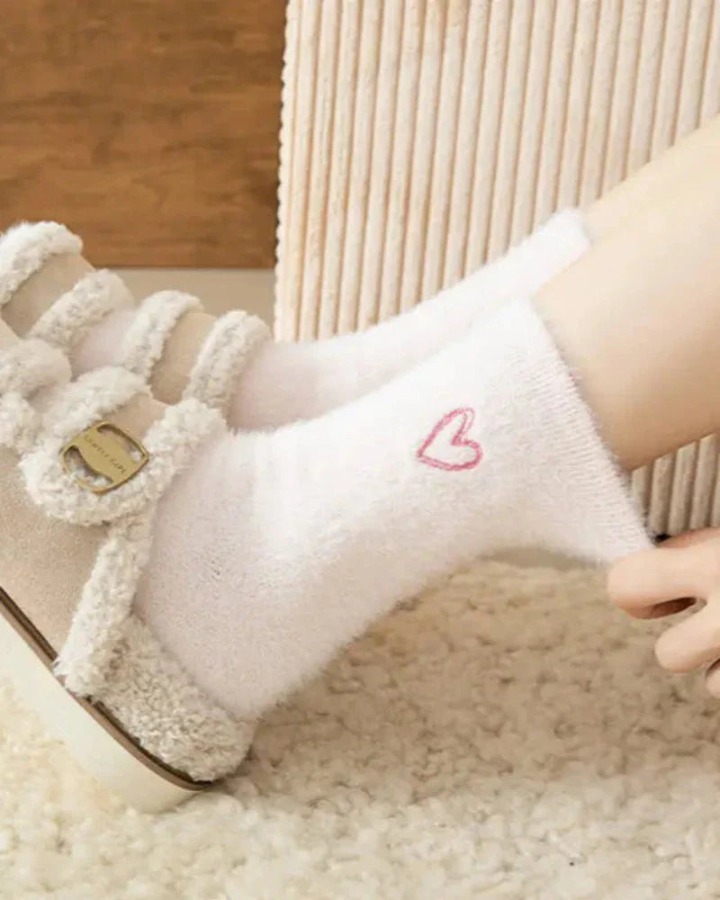 Calze lunghe e pelose con cuore