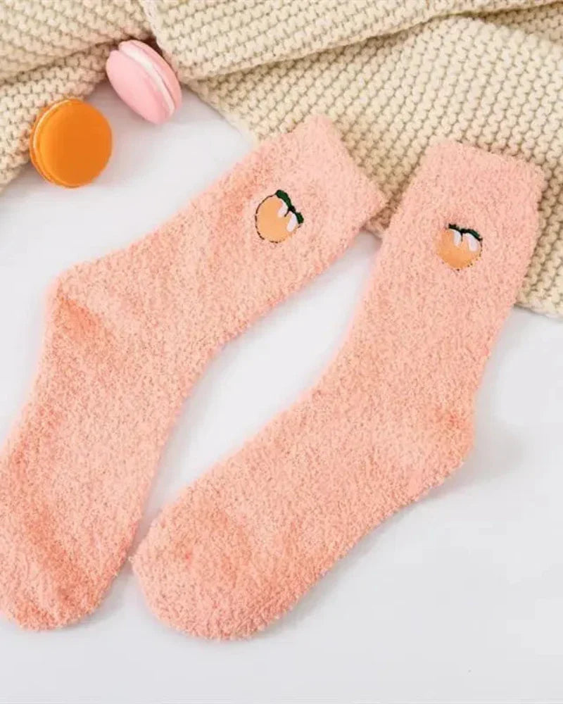 Calze lunghe e pelose con ricamo
