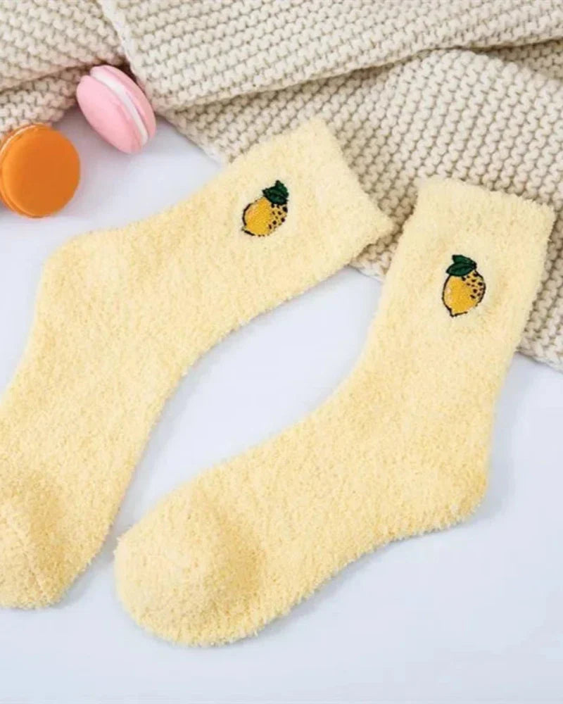 Calze lunghe e pelose con ricamo