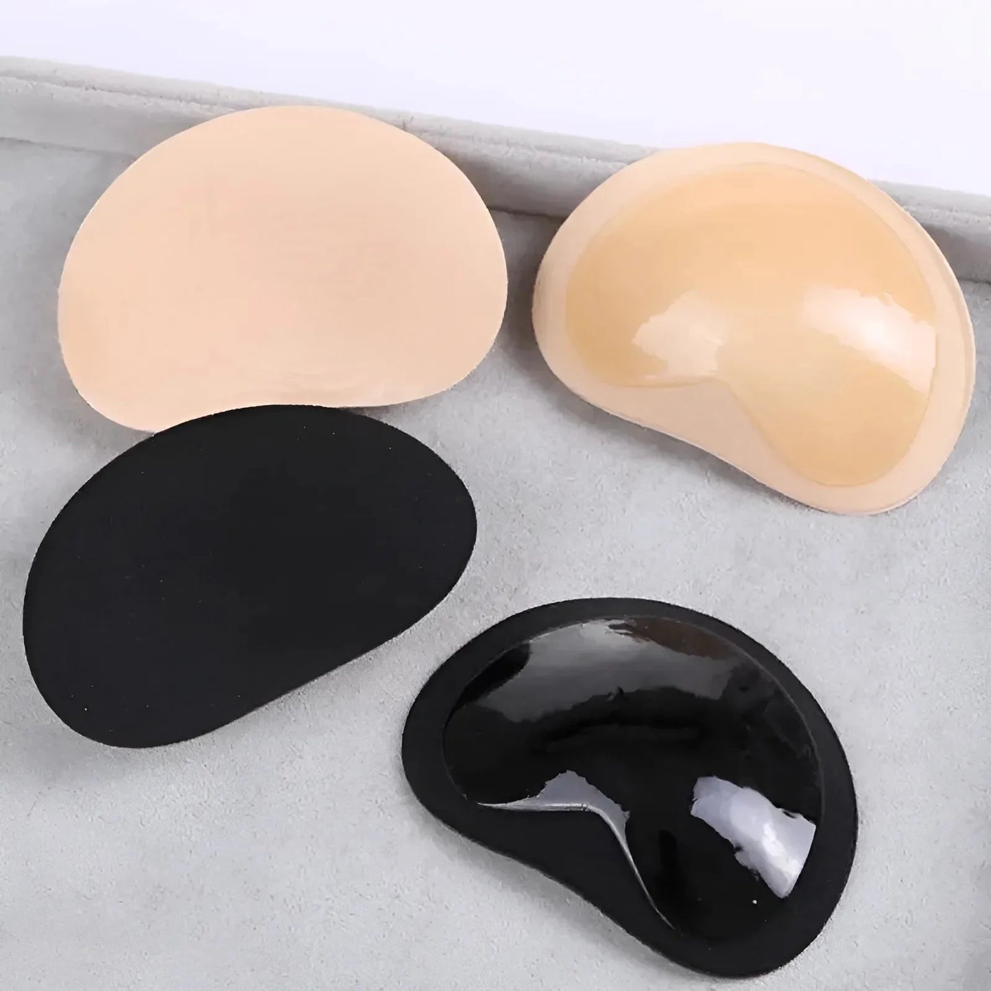 Inserti per reggiseno in tessuto adesivo
