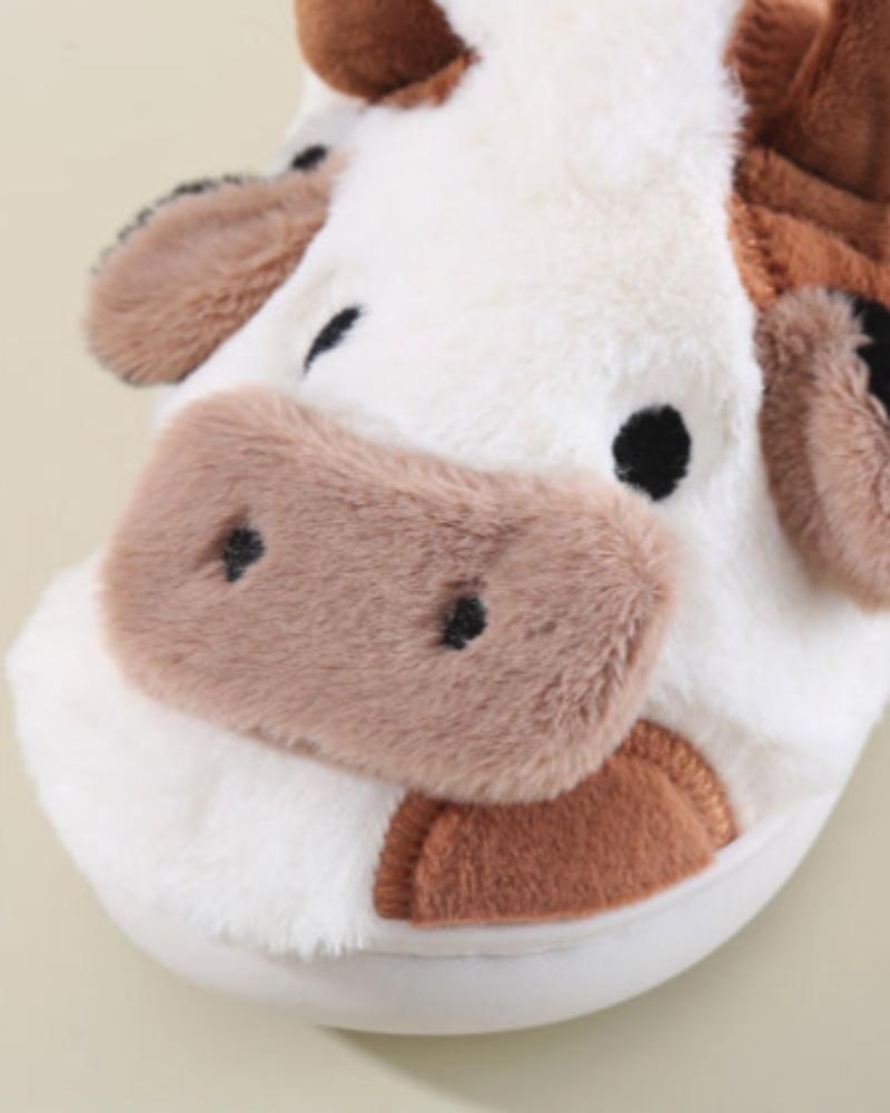 Pantofole pelose a forma di mucca