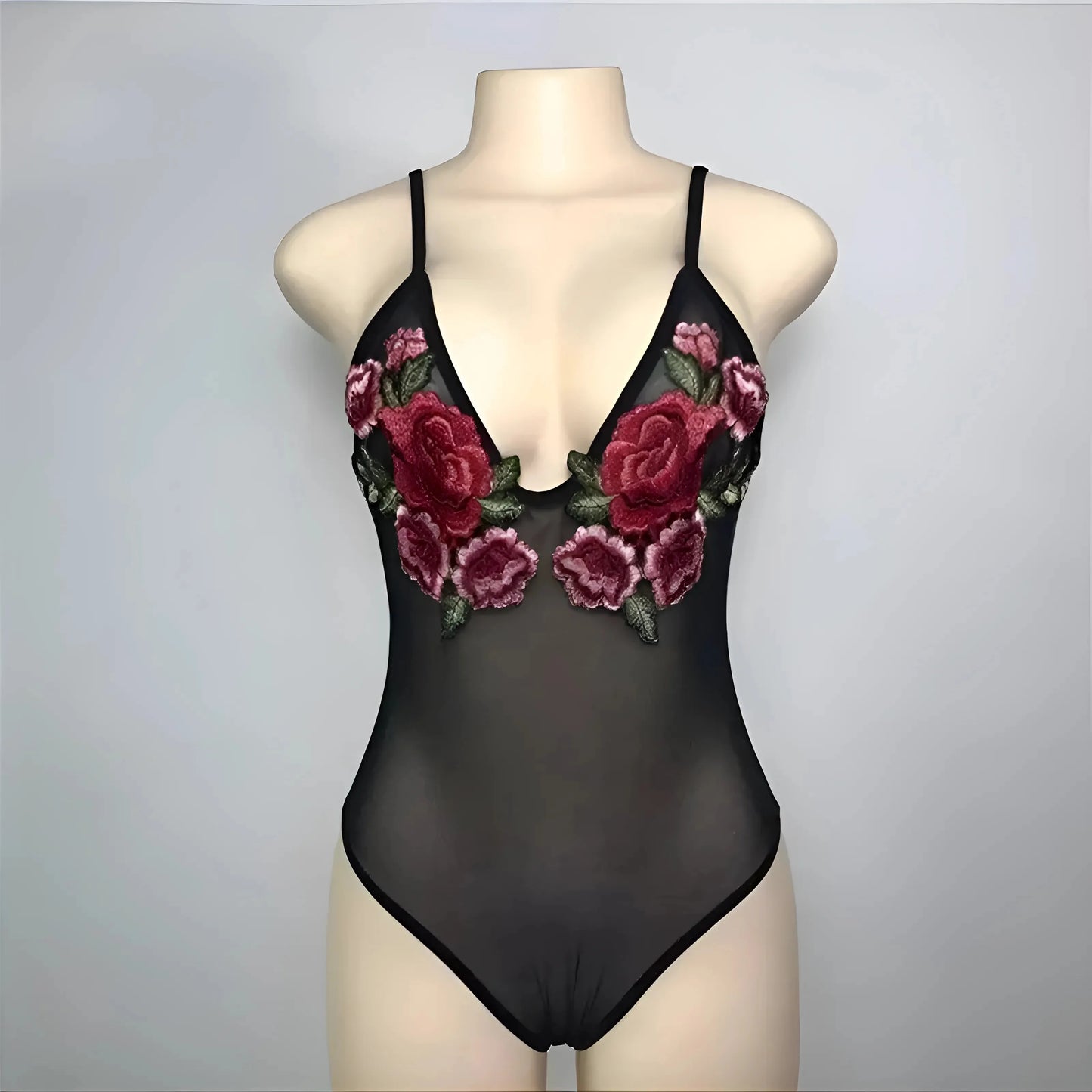 Body in pizzo con dettagli a rosa