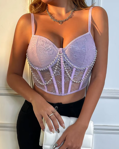 Reggiseno con catena decorativa di perle