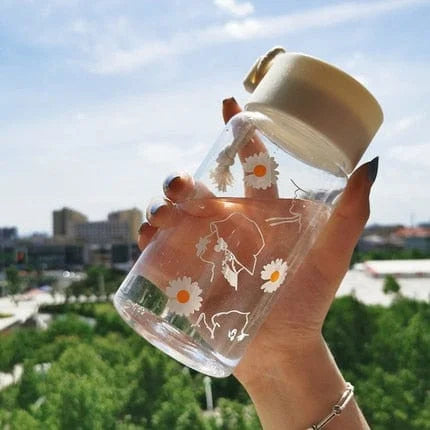Bottiglia d’acqua con margherite - trasparente
