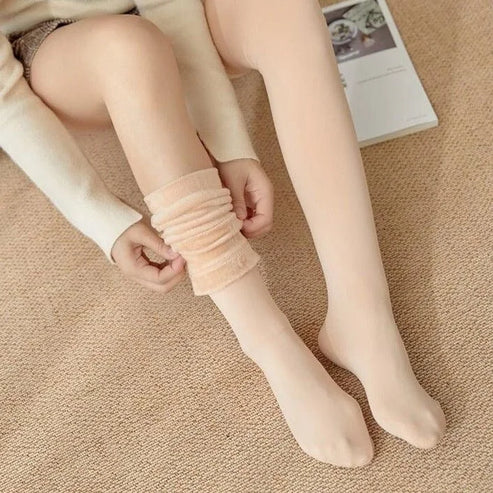 Calzini sopra il ginocchio isolati da donna - beige