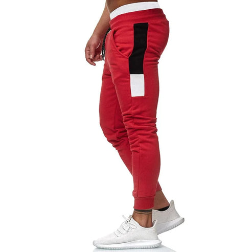 Pantaloni da tuta aderenti maschili - rosso / s