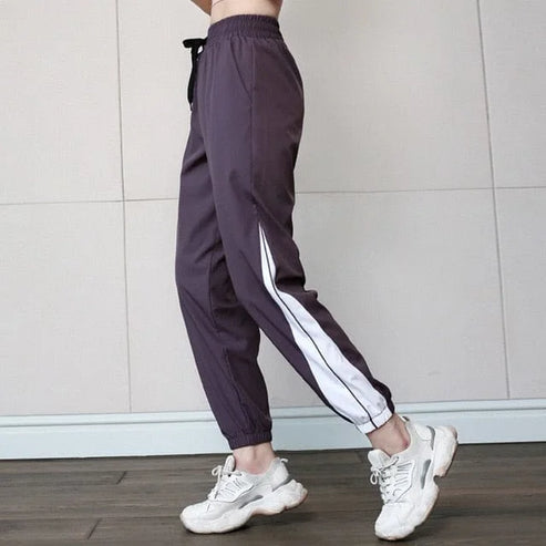Pantaloni da tuta sportivi con inserti laterali - viola / s