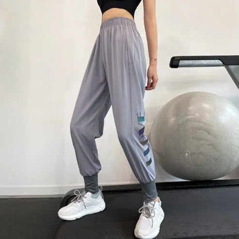 Pantaloni da tuta sportivi con scritte laterali - grigio / s