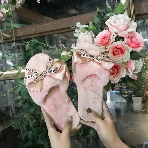 Pantofole da donna con fiocco - rosa / 36