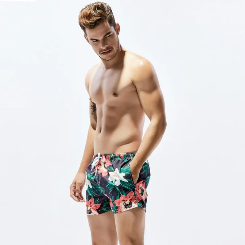 Shorts da bagno uomo corti con fiori hawaiani