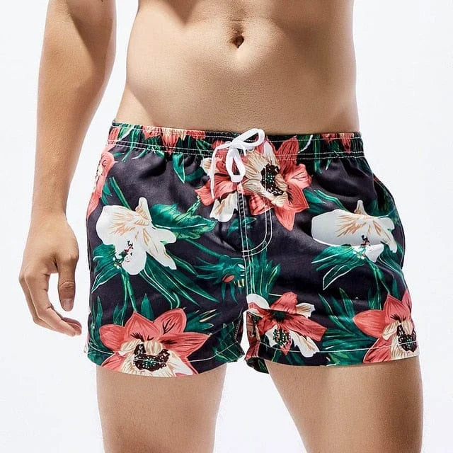 Shorts da bagno uomo corti con fiori hawaiani