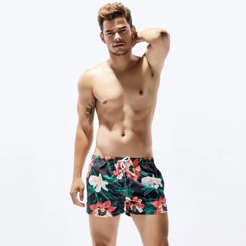 Shorts da bagno uomo corti con fiori hawaiani - multicolore / s